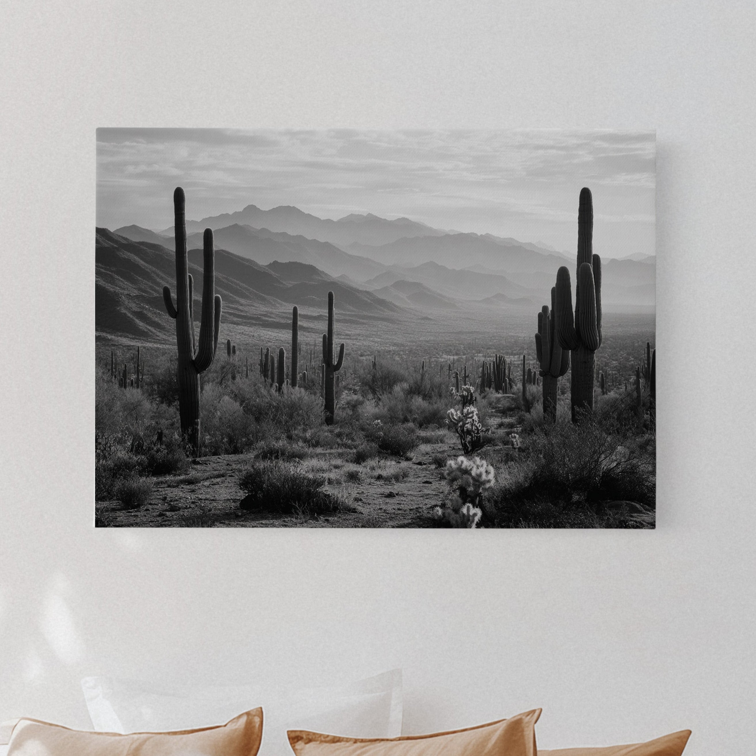 Bedroom with a large wall art print of a desert landscape featuring cacti.