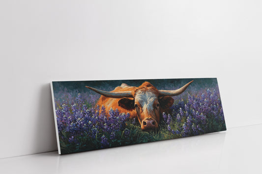 Texas Longhorn Resting in Bluebonnet Meadow