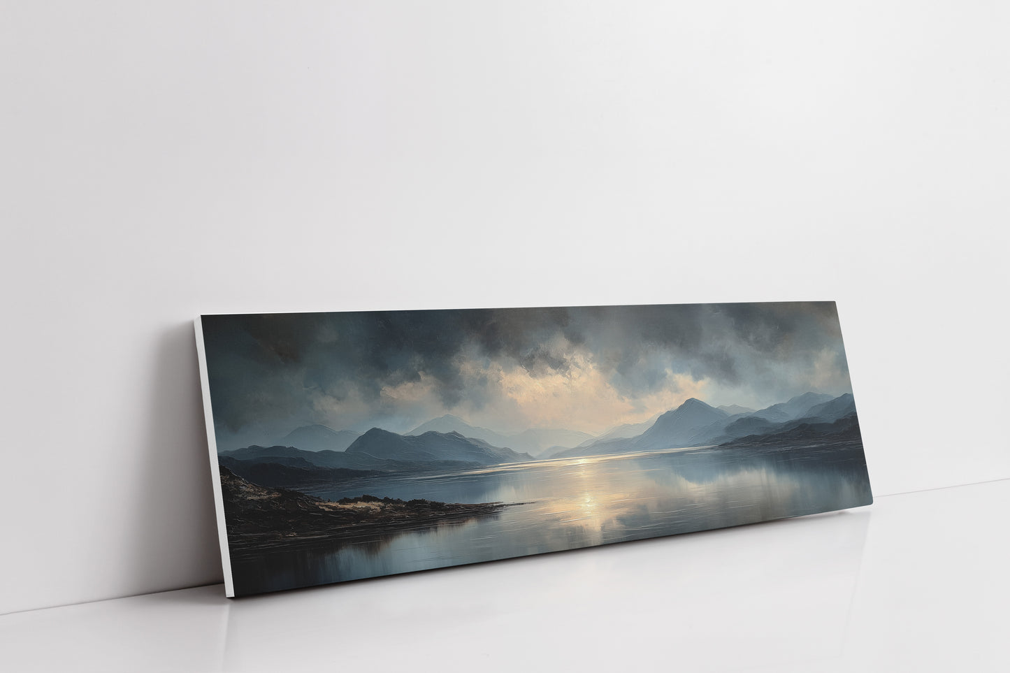 Moody Mountain Lake at Sunrise Reflected in Calm Water