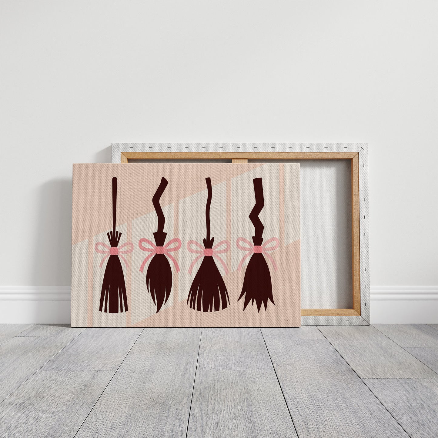 Brooms Tied With Pink Ribbons