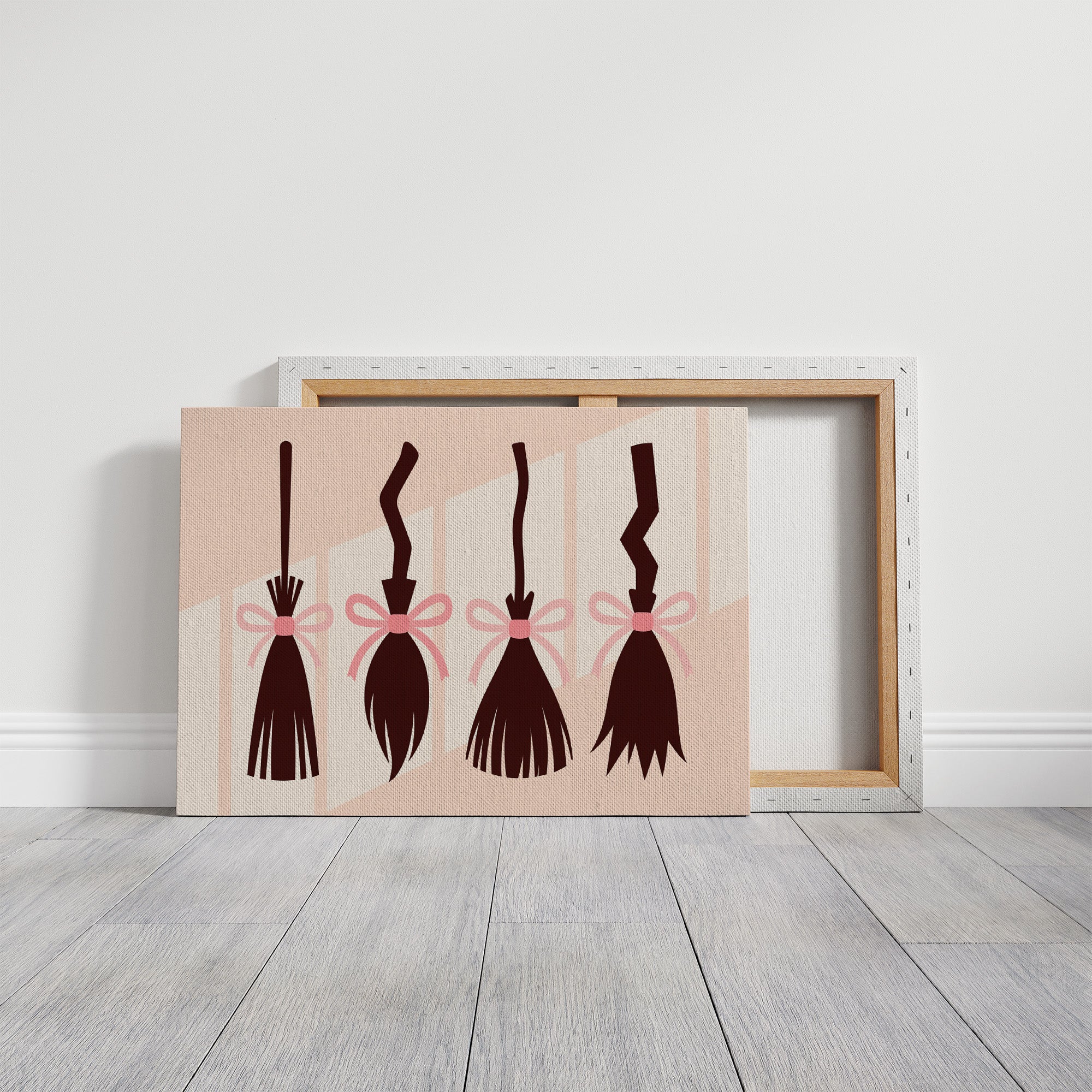 Brooms Tied With Pink Ribbons
