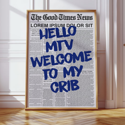 Framed newspaper with 'Hello MTV Welcome to my Crib' text in a room with wooden floor and white walls.