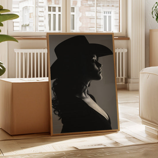 Framed black and white portrait of a woman in a living room with plants and furniture.