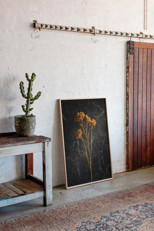 Golden Blooms Against Timeless Stone