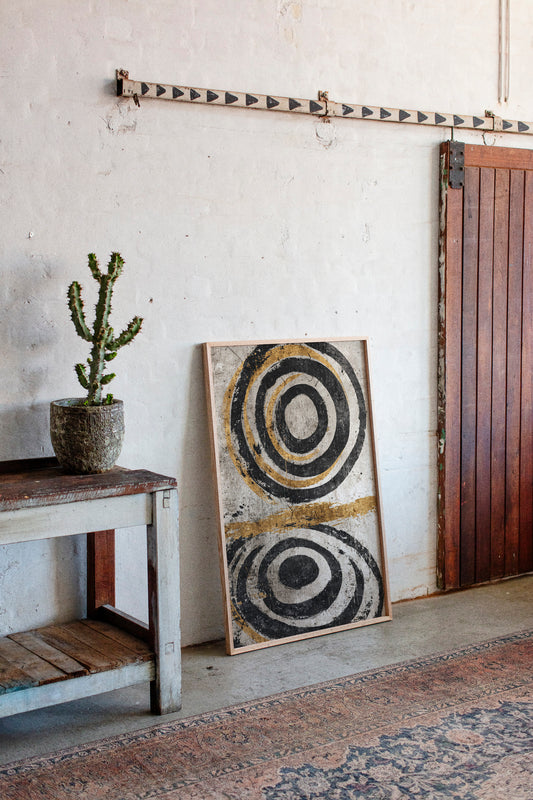 Golden Circles on Weathered Canvas