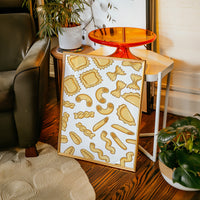 Pasta Shapes Dance In Golden Light