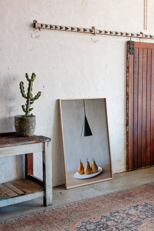 Three Pears Under Modern Light
