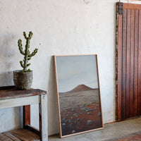 Solitary Peak In Rust And Stone