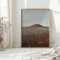 Solitary Peak In Rust And Stone