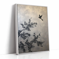 Bird Takes Flight Through Cherry Blooms