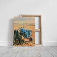 Old Blue: Sun-Kissed Tractor in the Prairie Grass