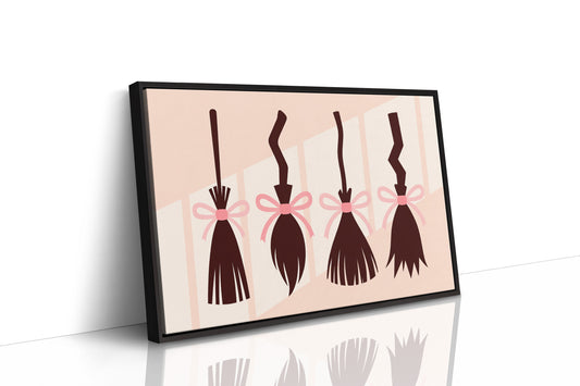 Brooms Tied With Pink Ribbons