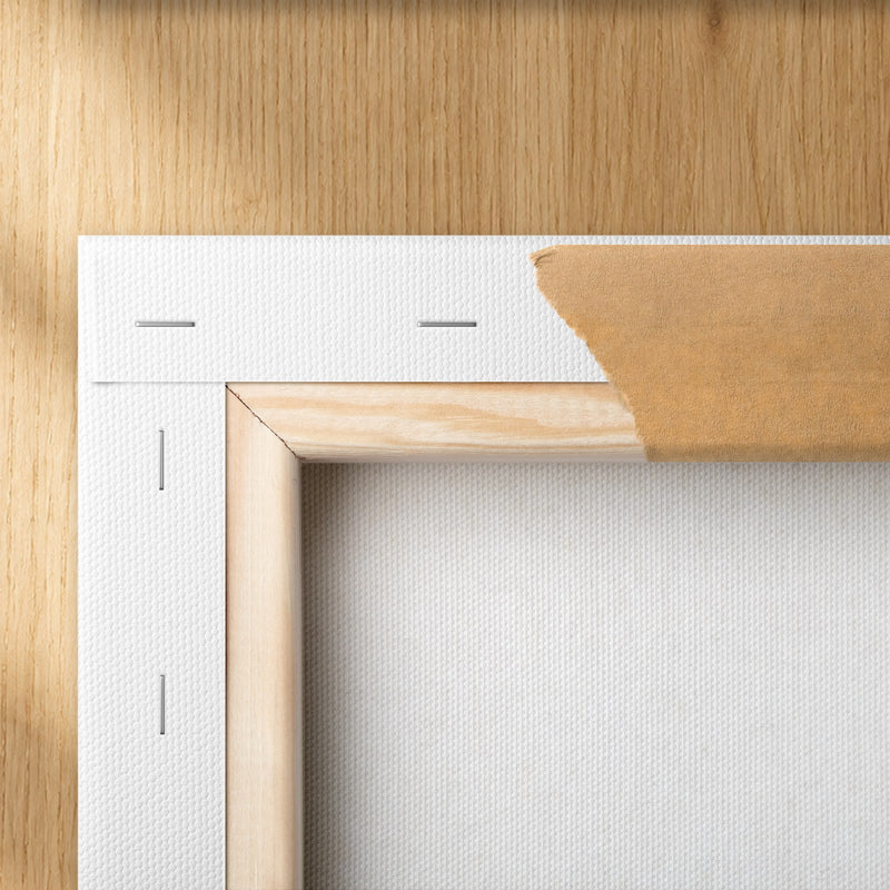 Back corner of a gallery wrap canvas, stretched and stapled over a pine frame