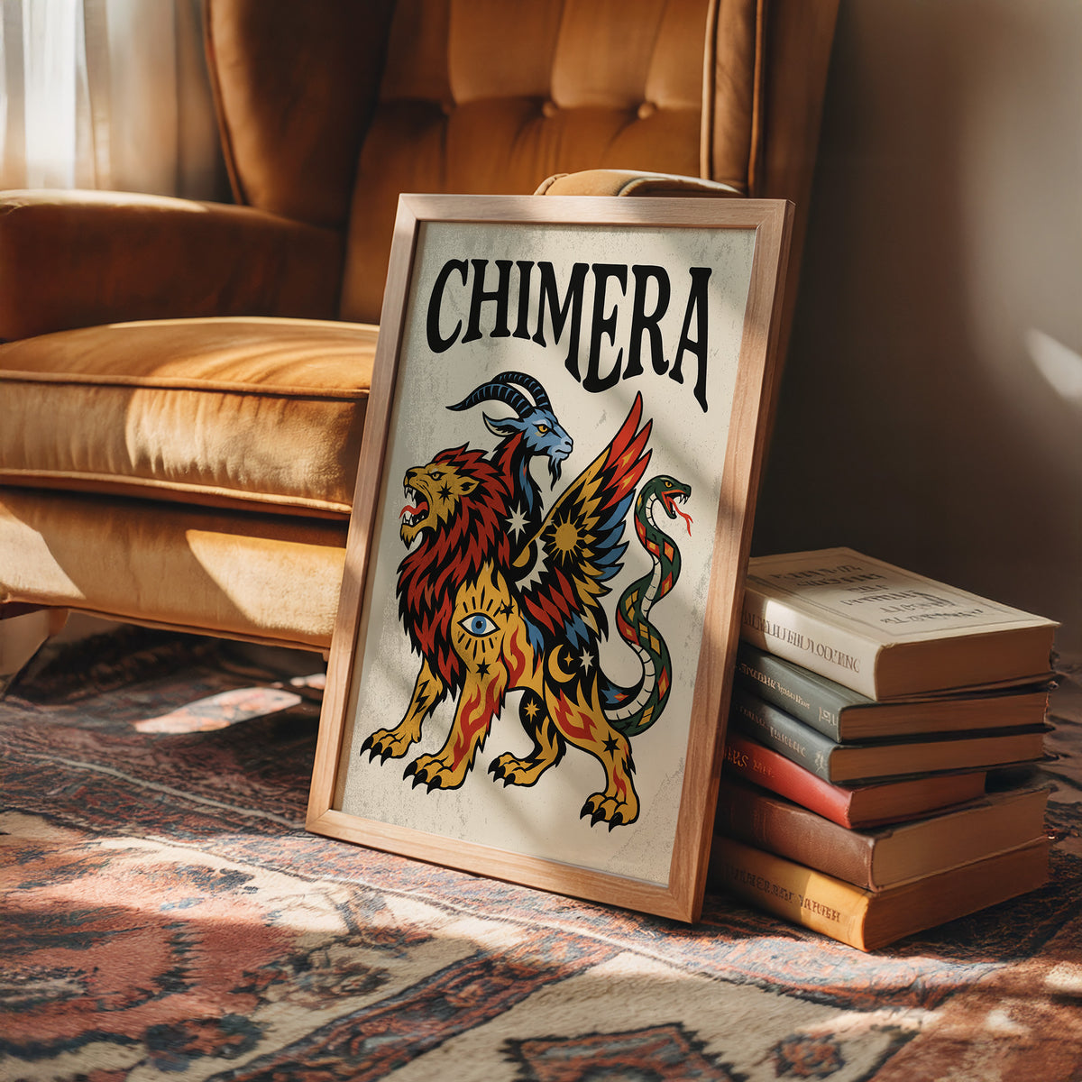 A Beast Made of Borrowed Parts, a chimera with a lion body, a goat head and a serpent tail, in gold, red and cream, drawn in a bold flash sheet style with a black lettered name across the top, in a wood frame on a leather armchair beside a stack of books