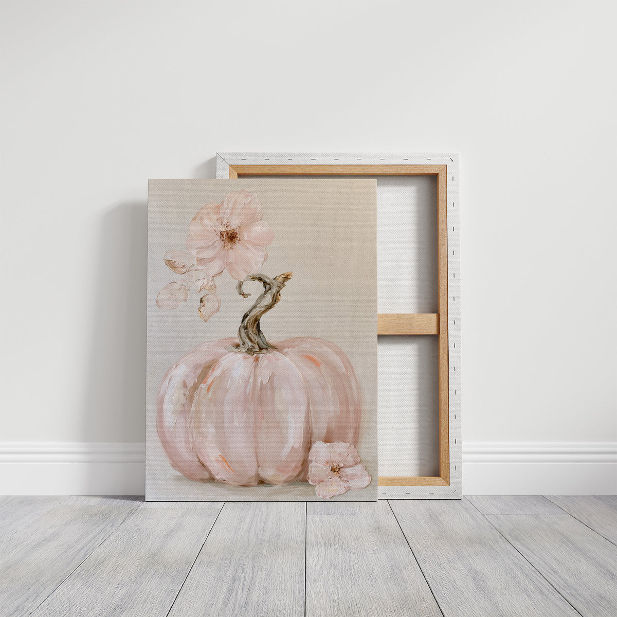 A Blush of Late Harvest, a pale blush pumpkin with a silver stem and a soft pink blossom painted on a cream ground, in a gentle watercolor style, on a gallery canvas with wrapped edges leaning against a white wall