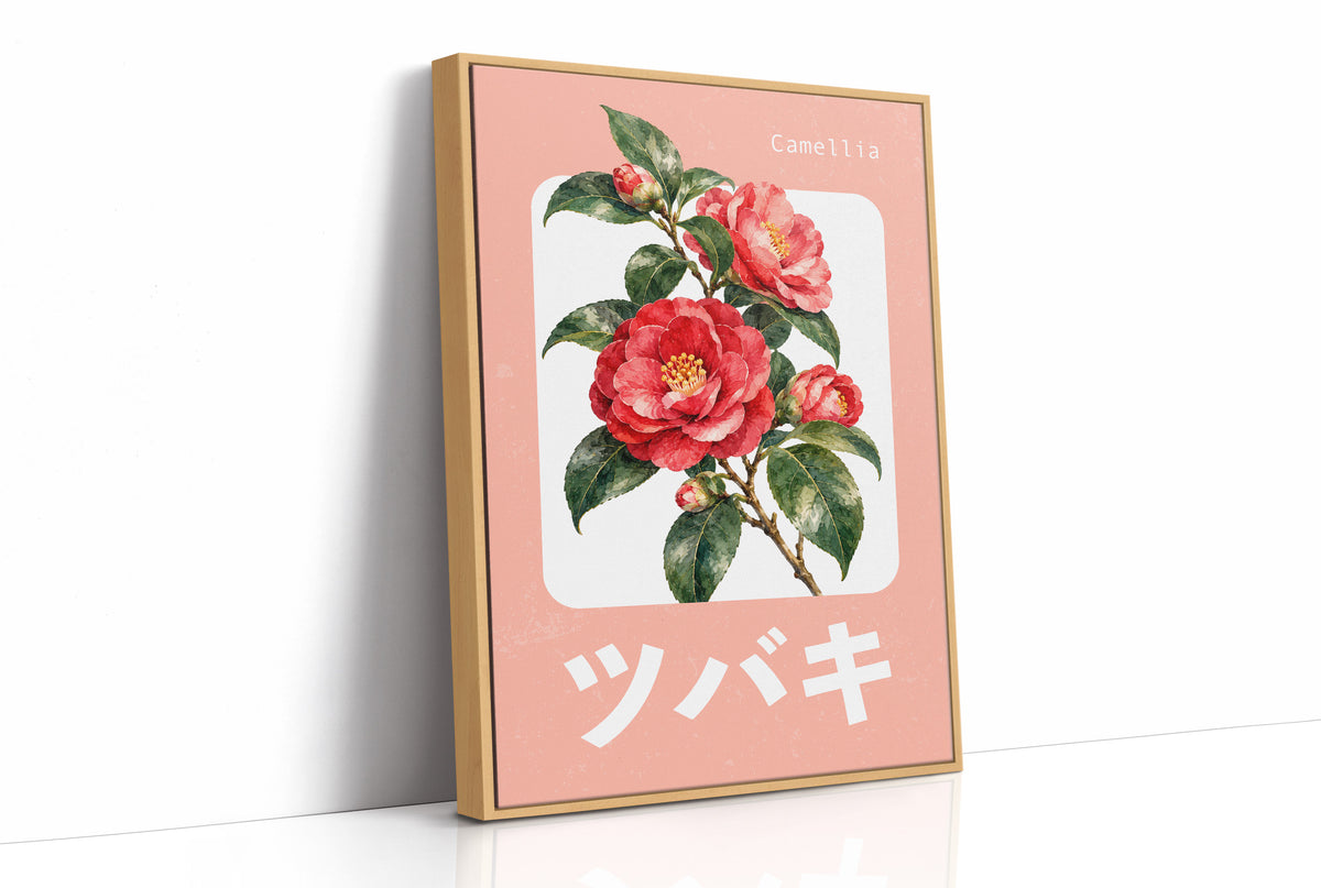 A Camellia Before Noon, a red camellia bloom with green leaves on a blush pink ground, with a rounded cream label and bold pale Japanese lettering, in a flat Japanese travel poster style painted in red, blush pink and cream, as a framed canvas in a natural wood frame