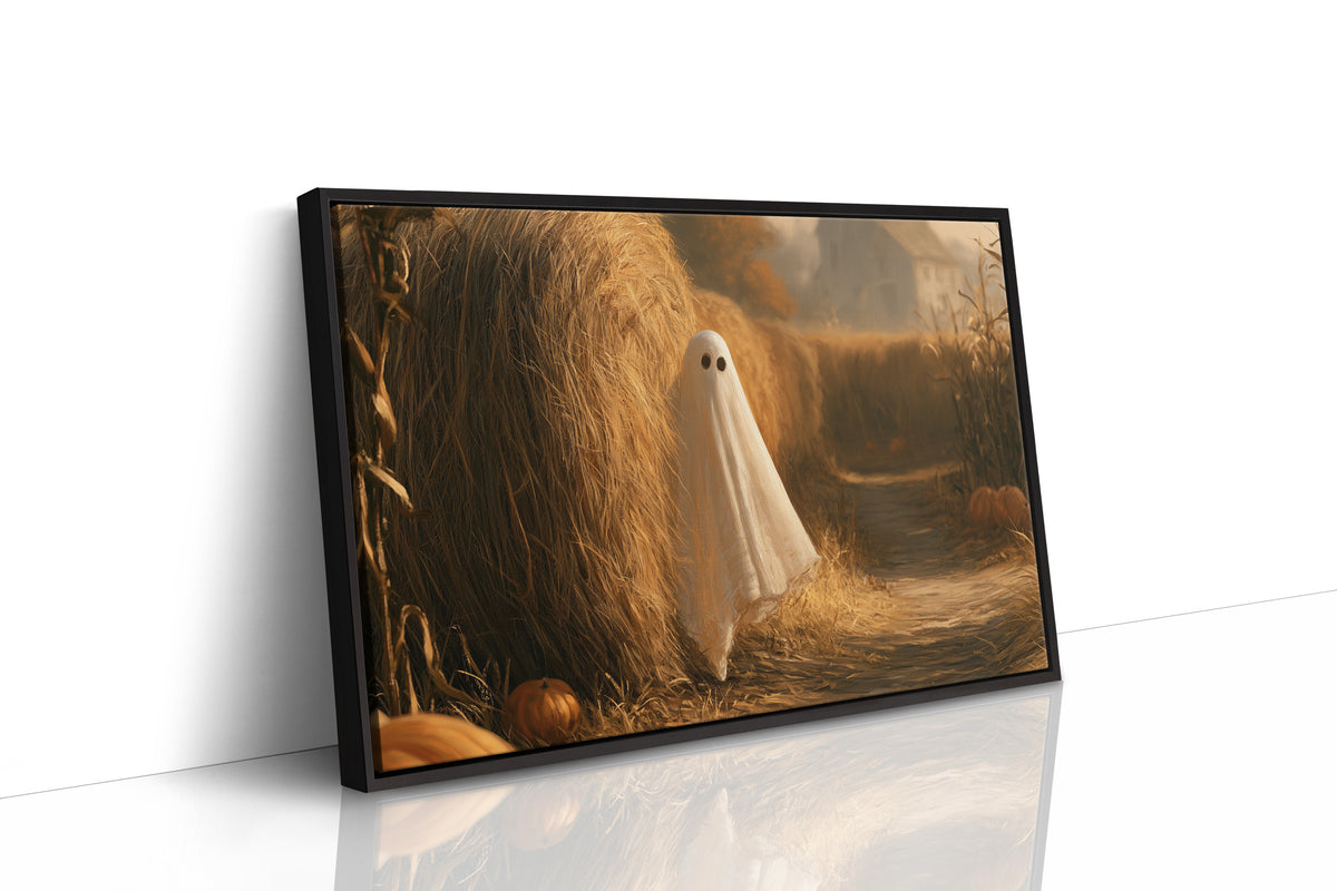 A Gentle Visitor in the Hay, a pale ghost drifting through a golden hay field at dusk, pumpkins glowing low in the grass beside a tall bale, as a framed canvas in a black frame