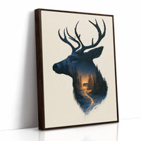 A Quiet Forest Inside the Antlers, a stag head silhouette in deep navy filled with a misty forest and a warm glowing clearing, on a cream ground, as a framed canvas in a brown frame