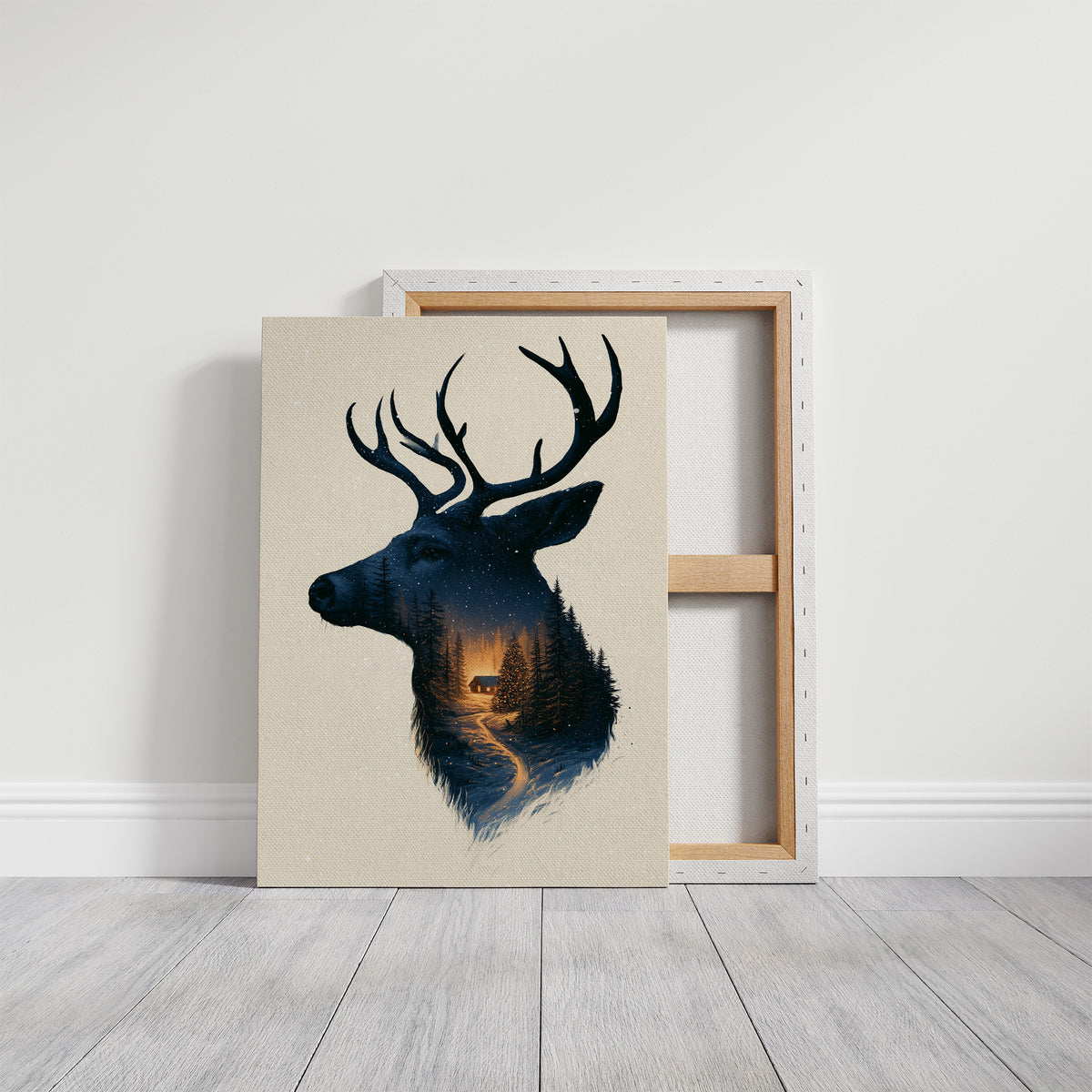 A Quiet Forest Inside the Antlers, a stag head silhouette in deep navy filled with a misty forest and a warm glowing clearing, on a cream ground, on a gallery canvas with wrapped edges leaning against a white wall