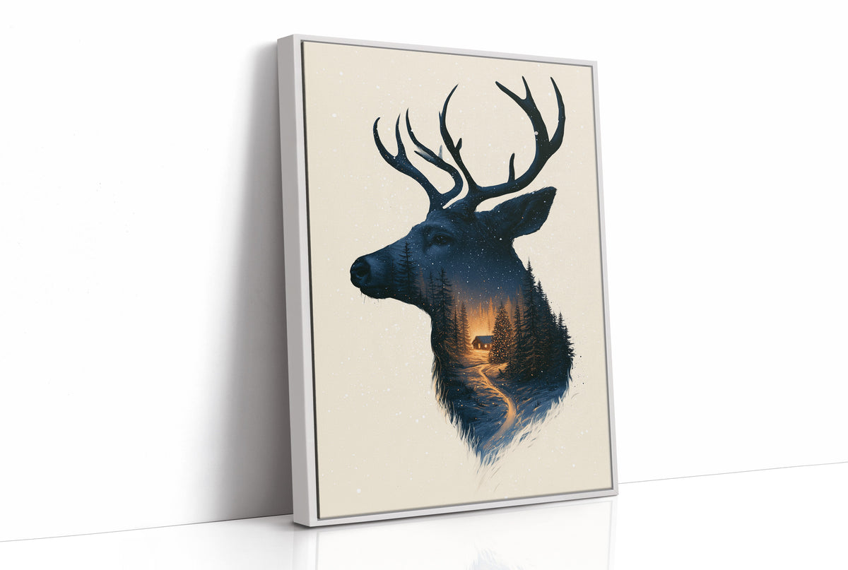 A Quiet Forest Inside the Antlers, a stag head silhouette in deep navy filled with a misty forest and a warm glowing clearing, on a cream ground, as a framed canvas in a white frame