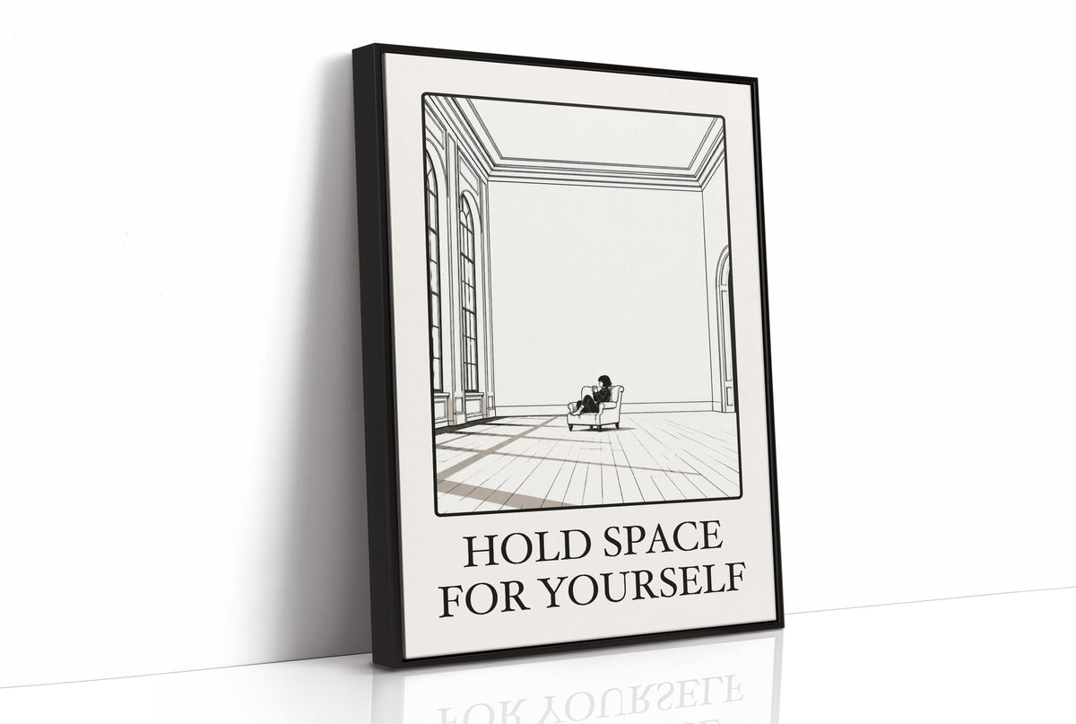 A Room Kept Open for You, a fine black line drawing of a tall empty room with a long floor, a pale window and a small seated figure, with the serif words HOLD SPACE and FOR YOURSELF beneath it on a cream ground, as a framed canvas in a black frame