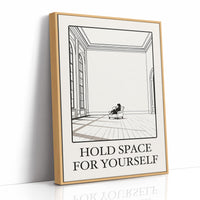 A Room Kept Open for You, a fine black line drawing of a tall empty room with a long floor, a pale window and a small seated figure, with the serif words HOLD SPACE and FOR YOURSELF beneath it on a cream ground, as a framed canvas in a natural wood frame