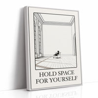 A Room Kept Open for You, a fine black line drawing of a tall empty room with a long floor, a pale window and a small seated figure, with the serif words HOLD SPACE and FOR YOURSELF beneath it on a cream ground, as a framed canvas in a white frame