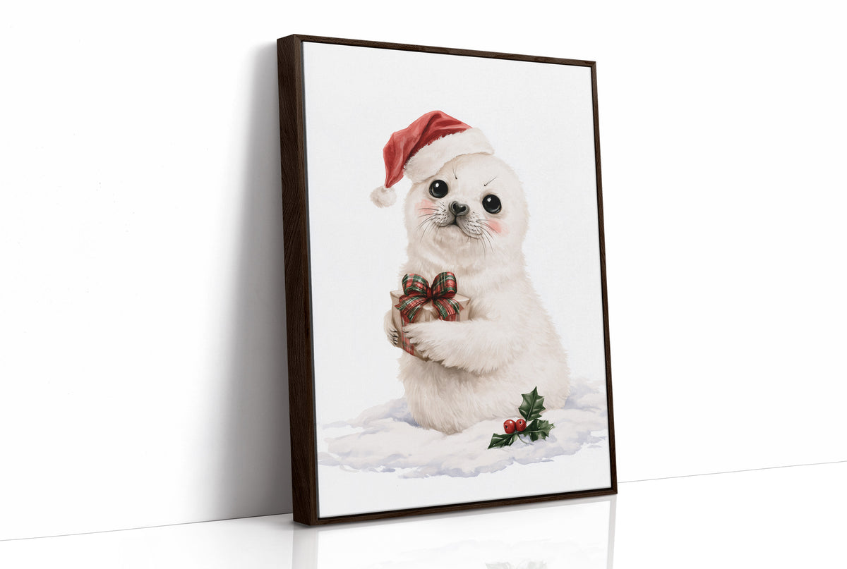 A Snowy Pup Waits for Morning, a white baby seal in a red Santa hat holding a chocolate bow, with a sprig of holly in the snow below, painted in soft cream, red and white, as a framed canvas in a brown frame