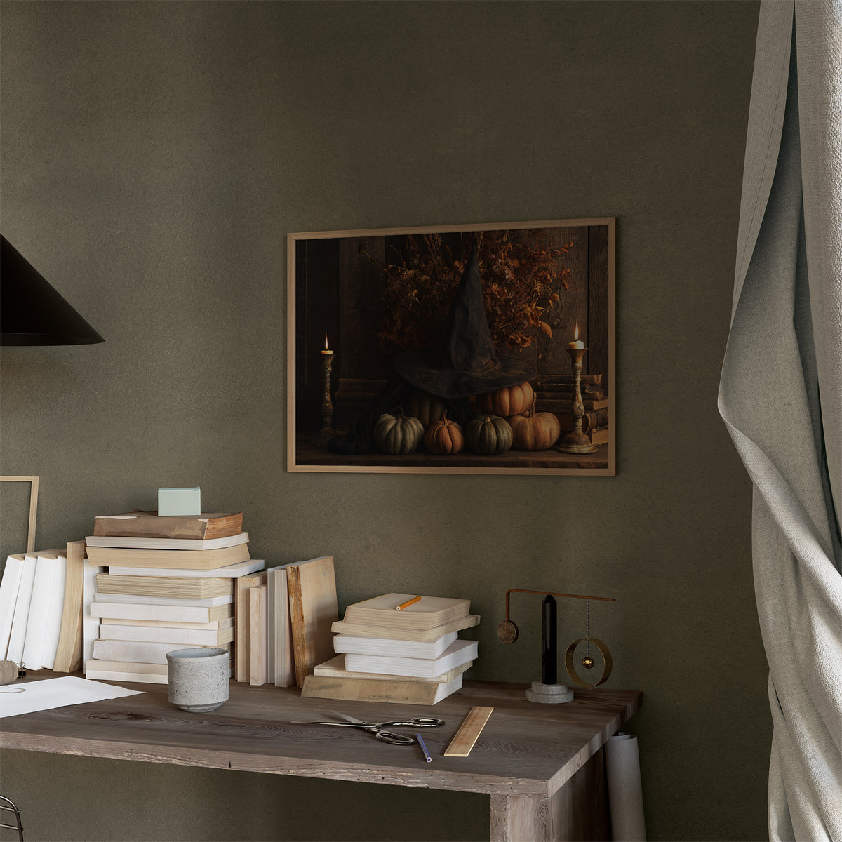 A Sorceress Counts the Pumpkins, witch in a pointed hat beside pumpkins and candles in a dark oil painting, in a thin wood frame on a moss green wall above a desk stacked with books