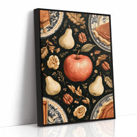 A Table Laid Before Dusk, a dark still life pattern of red apples, pale pears, walnuts and autumn leaves around pie plates, painted in charcoal, cream and rust, as a framed canvas in a black frame