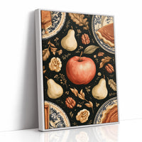 A Table Laid Before Dusk, a dark still life pattern of red apples, pale pears, walnuts and autumn leaves around pie plates, painted in charcoal, cream and rust, as a framed canvas in a white frame