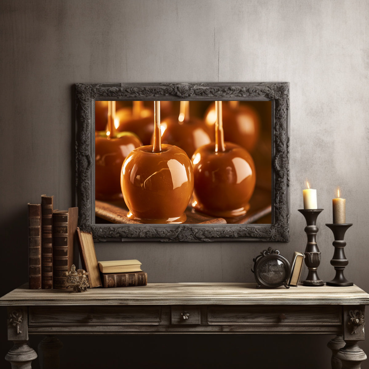Caramel Glow at Dusk, three glossy caramel glazed apples on sticks in warm candlelight, painted in amber, burnt sugar and deep brown, in a dark carved frame on a gray wall above a console table with candlesticks and old books
