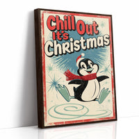 Chill Out, Cold Is Cozy, a vintage style penguin in a red scarf and a Santa hat sitting on a snowy patch, with a retro sign line of bold lettering above him, in red, cream and soft teal, as a framed canvas in a brown frame