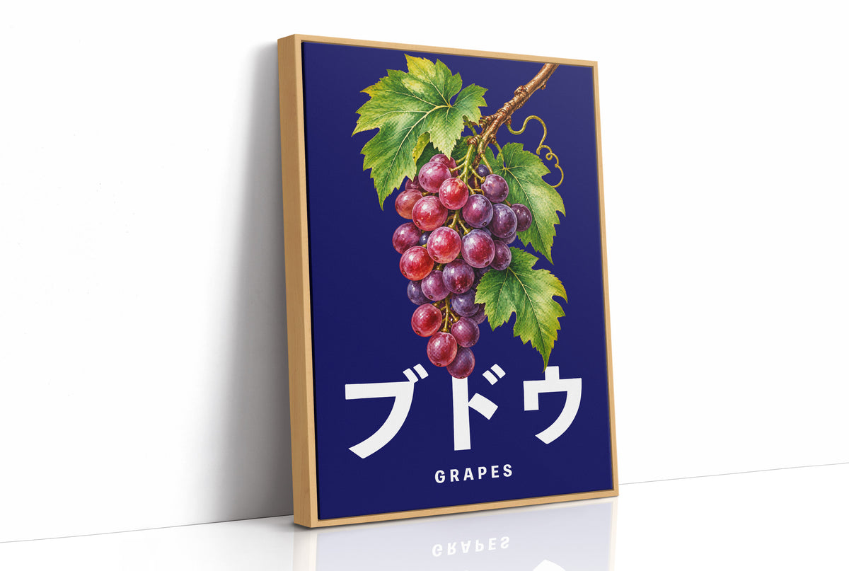 Clusters Heavy Over Midnight Water, a cluster of rose and purple grapes with green leaves hanging from a stem on a deep navy ground, with the Japanese katakana set in large white letters and the word GRAPES in small capitals beneath, as a framed canvas in a natural wood frame