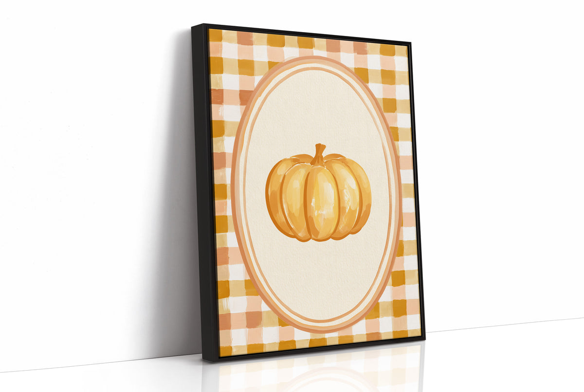 Dressed Up for a Quiet Afternoon, a single orange pumpkin in a cream oval medallion framed by a yellow and rust gingham border, painted in mustard, cream and burnt orange, as a framed canvas in a black frame
