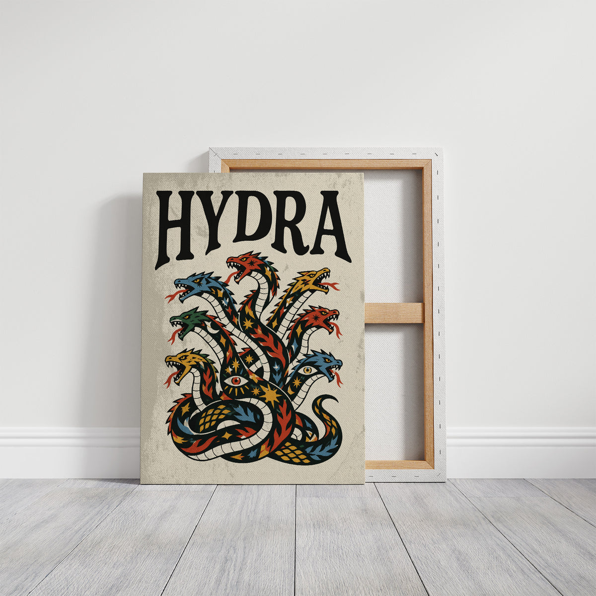 Every Head Grows Back Bolder, a many headed serpent with blue, red and gold scales rising in fans of heads, in a bold flash sheet style with a black lettered name across the top on a cream ground, on a gallery canvas with wrapped edges leaning against a white wall