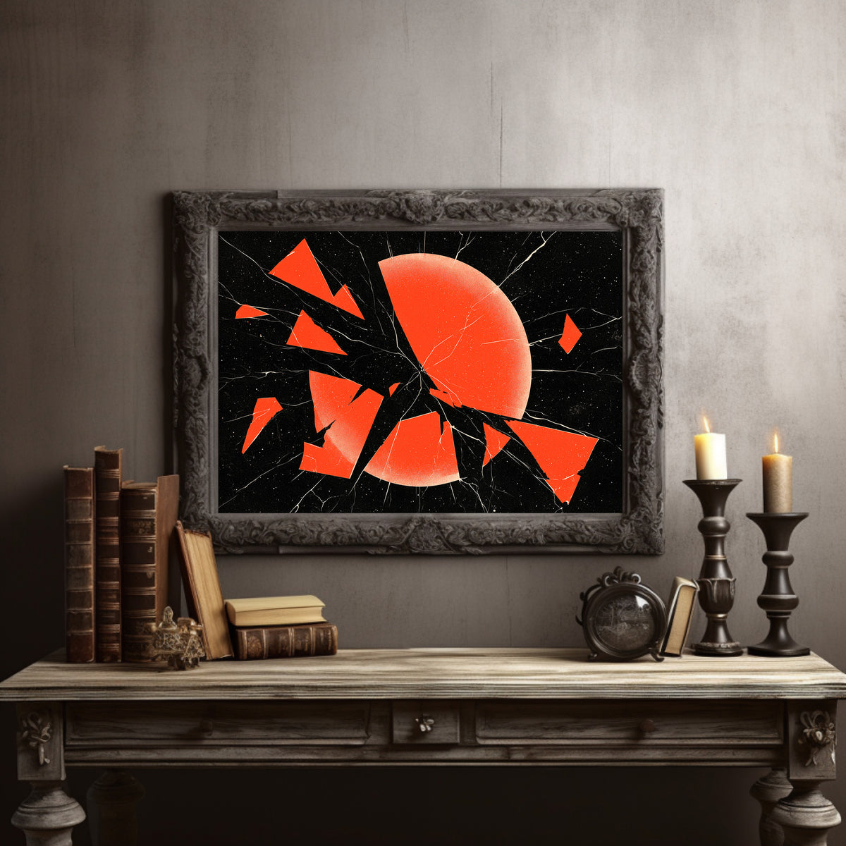 Everything Cracked, Nothing Dimmed, shattered red sun abstract on black, in a dark carved frame on a gray wall above a console table with candlesticks and old books