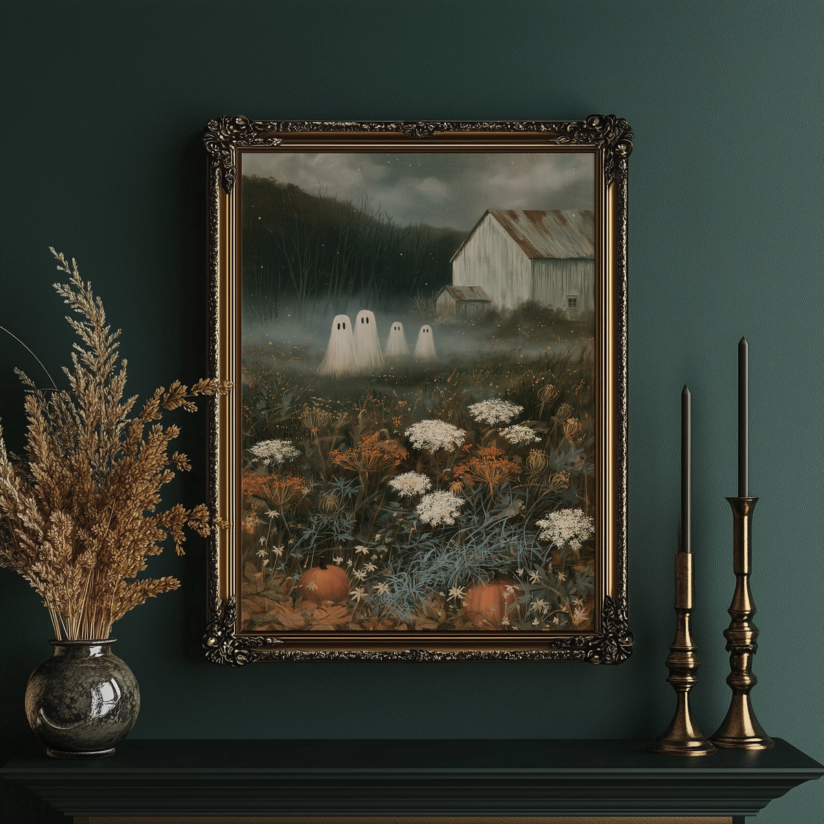 Fog Settles on the Low Field, a dark barn on a hill above a meadow of cream and rust wildflowers, a pale mist in the valley and two faint pale figures at the edge of the field, painted in forest green, rust and bone, in an ornate gold frame on a deep green wall beside tall brass candlesticks