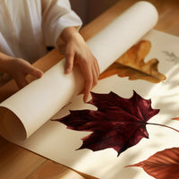Gold Keeps Its Shape, a cluster of pressed autumn leaves in rust, maroon and gold on a cream ground, drawn in a botanical journal style, as a matte poster, unframed