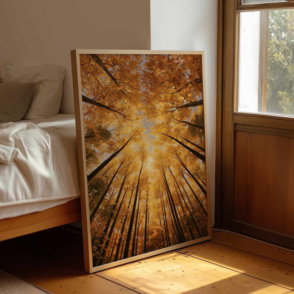Gold Light Climbs the Tall Trees, a view straight up through tall forest trunks to a canopy lit gold from within, with shafts of warm light falling through the leaves, in amber, deep gold and forest brown, leaning on a wood floor in a bedroom beside white linen bedding