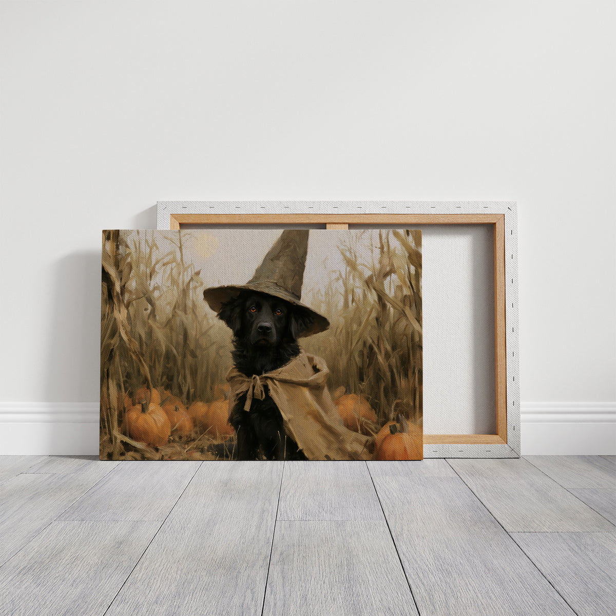 Good Boy, Bad Spell, black dog in a witch hat in a pumpkin patch painting, on a gallery canvas with wrapped edges leaning against a white wall