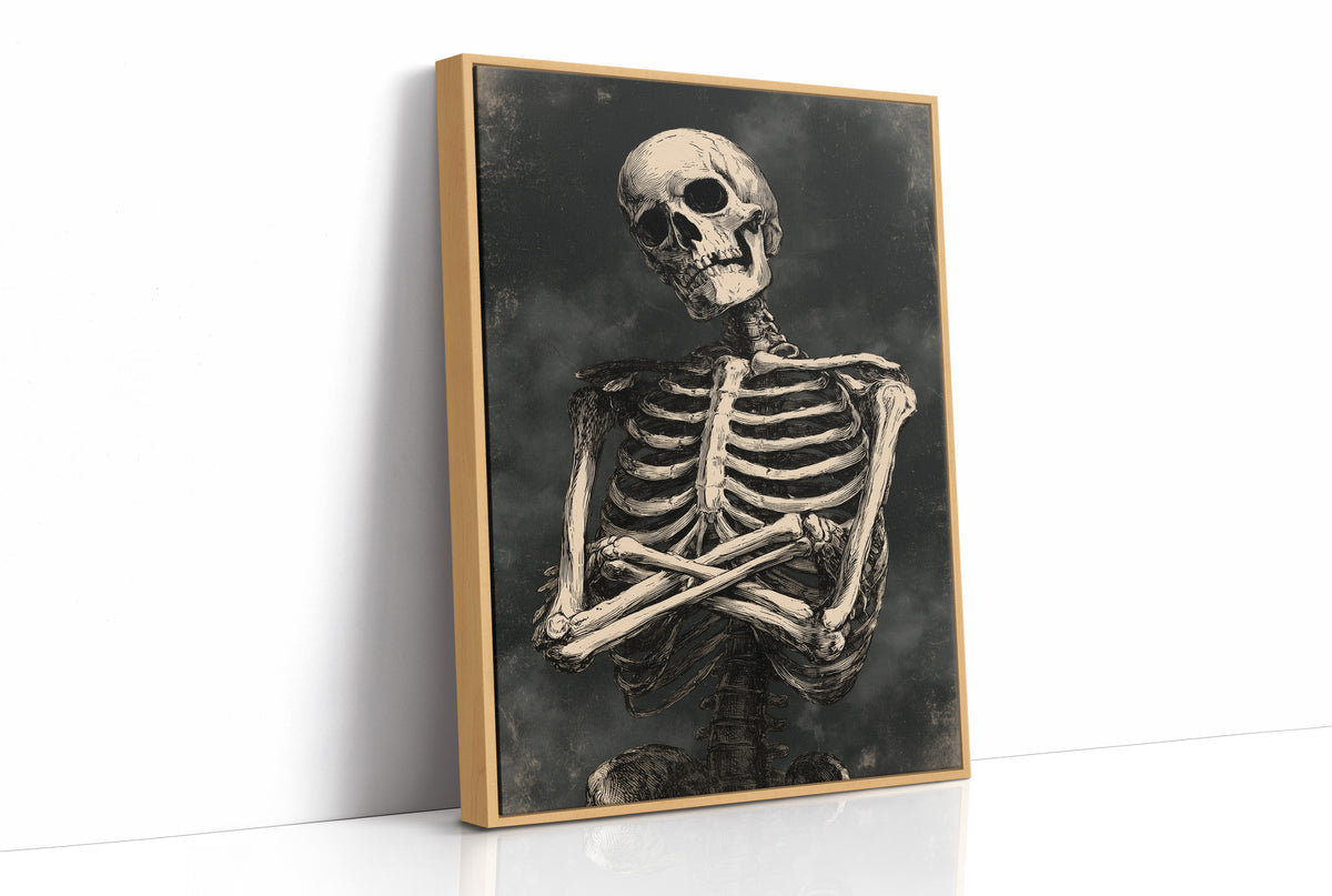 He Keeps His Arms Folded, a seated skeleton with crossed arms and bare ribs against a smoky charcoal ground, painted in bone, charcoal and ash gray, as a framed canvas in a natural wood frame