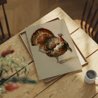 He Keeps His Feathers Open, a vintage painting of a wild turkey standing on a warm taupe ground, with rust, bronze and umber plumage and a tail half raised, lying flat on a light wood table beside a coffee cup and red berries
