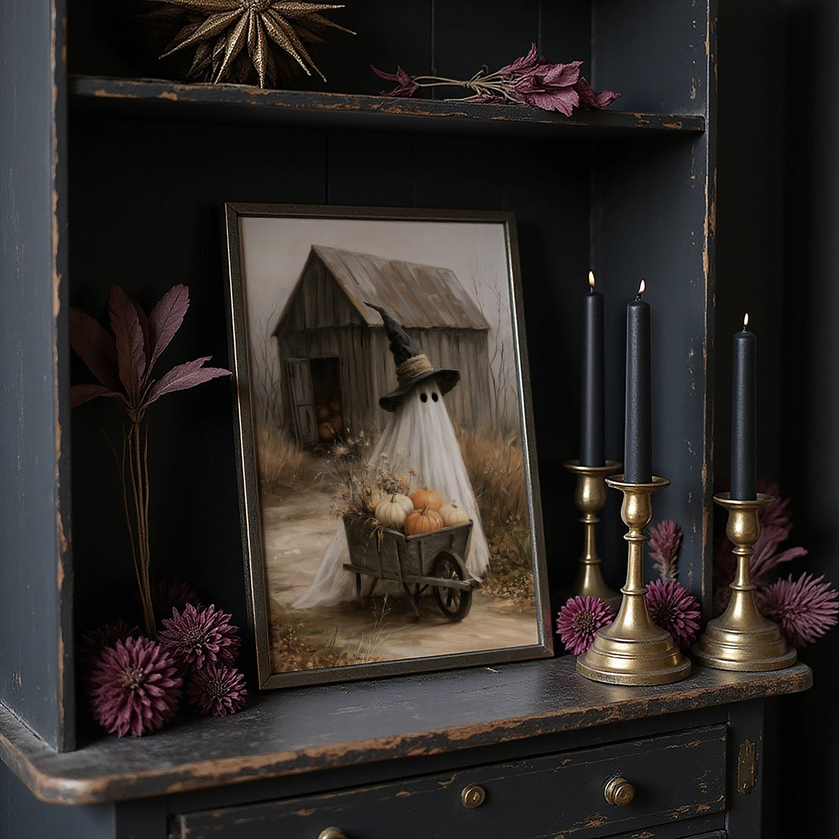 Just Passing Through, Boo, a ghost in a witch hat pushing a wheelbarrow of pumpkins past a weathered shed, painted in straw, gray and pale white, on a dark wooden cabinet shelf with candles and dried flowers
