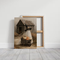 Just Passing Through, Boo, a ghost in a witch hat pushing a wheelbarrow of pumpkins past a weathered shed, painted in straw, gray and pale white, on a gallery canvas with wrapped edges leaning against a white wall