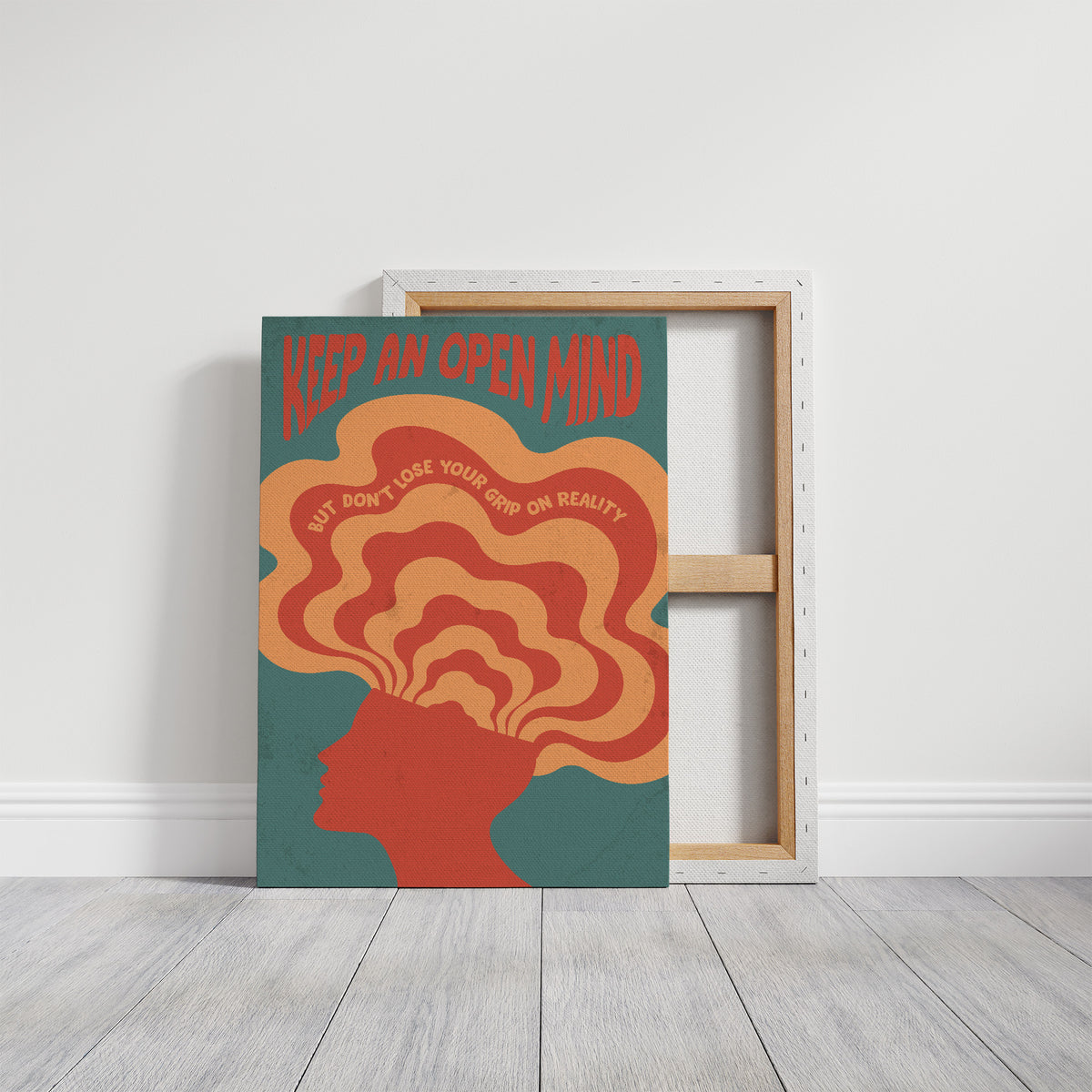 Keep an Open Mind Anyway, a psychedelic head in profile with concentric rings of orange, cream and red rising out of the crown, on a teal ground, with the words KEEP AN OPEN MIND in red lettering across the top and a small line, BUT DON'T LOSE YOUR GRIP ON REALITY, curved around the rings, on a gallery canvas with wrapped edges leaning against a white wall