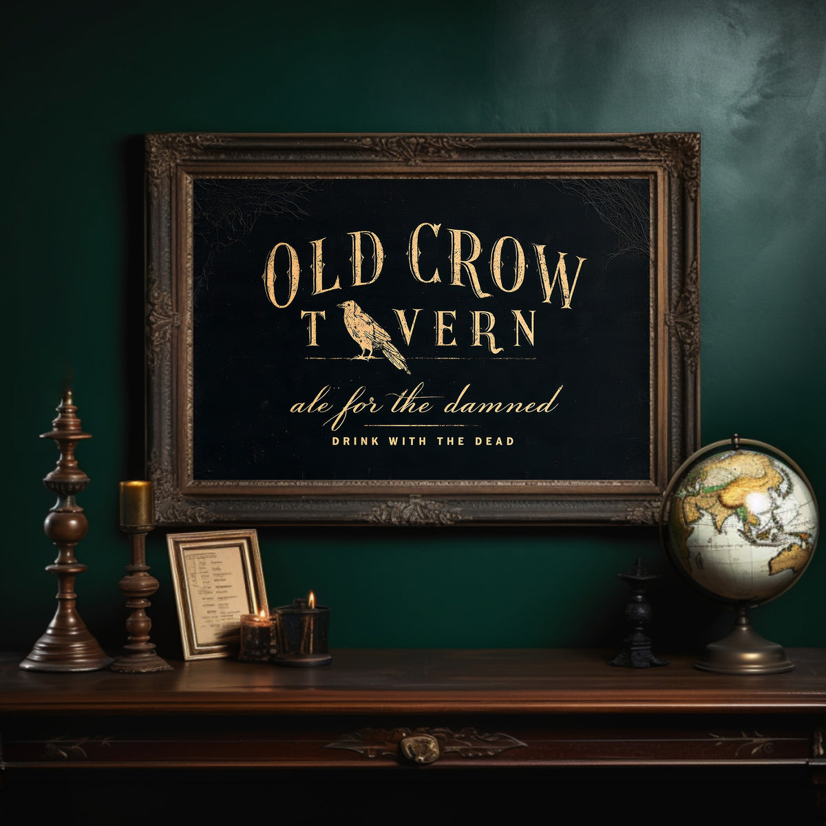 Last Call for the Restless, a black tavern sign lettered in gold with a perched golden bird, painted in black, oxblood and antique gold, in an ornate dark frame on a deep green wall above a mantel with a globe and candles