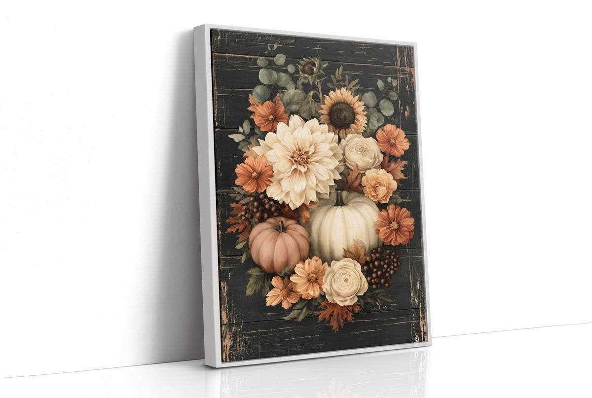 Late Blooms Remember the Harvest, a dark floral bouquet of dahlias, cream roses and small pumpkins with eucalyptus, painted in cream, rust and burnt orange on a black ground, as a framed canvas in a white frame