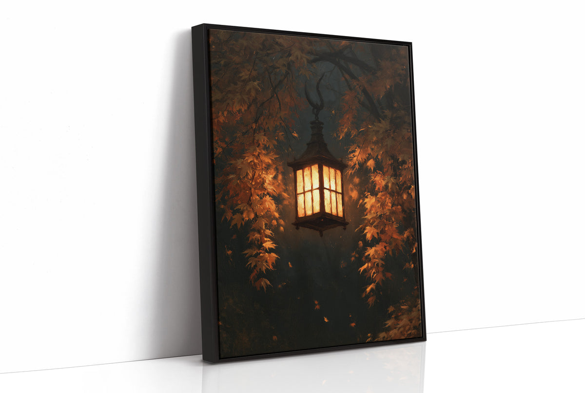Left On for Someone, a glowing iron lantern hanging in a dark thicket of rust and amber leaves, painted in deep brown, ember orange and warm gold, as a framed canvas in a black frame