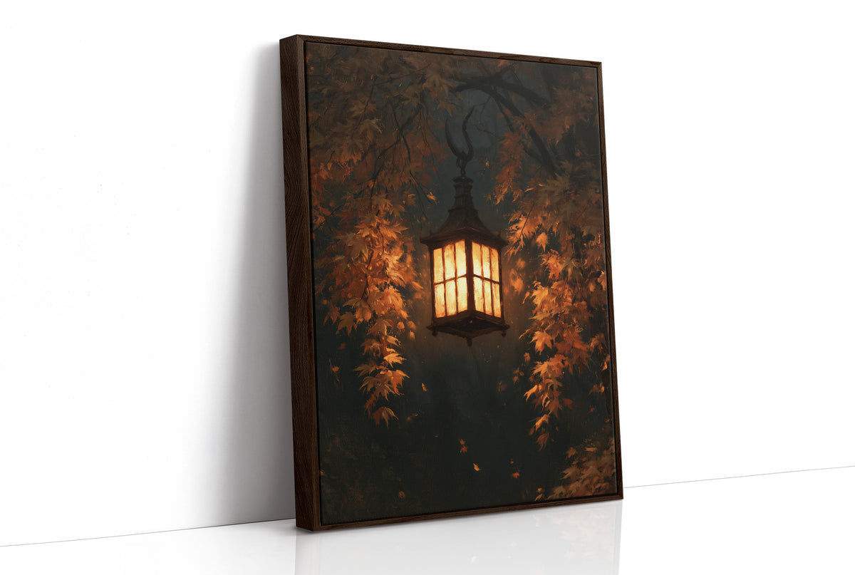 Left On for Someone, a glowing iron lantern hanging in a dark thicket of rust and amber leaves, painted in deep brown, ember orange and warm gold, as a framed canvas in a brown frame